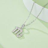 Scorpio glyph pendant on silver-tone chain with pavé-look stones