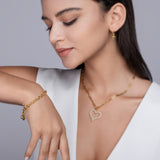 Yellow gold vermeil toggle bracelet with coin charm and round moissanite stone