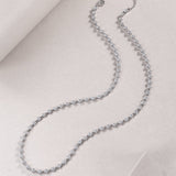 Bezel-set moissanite tennis necklace, white gold vermeil, repeating round stone links