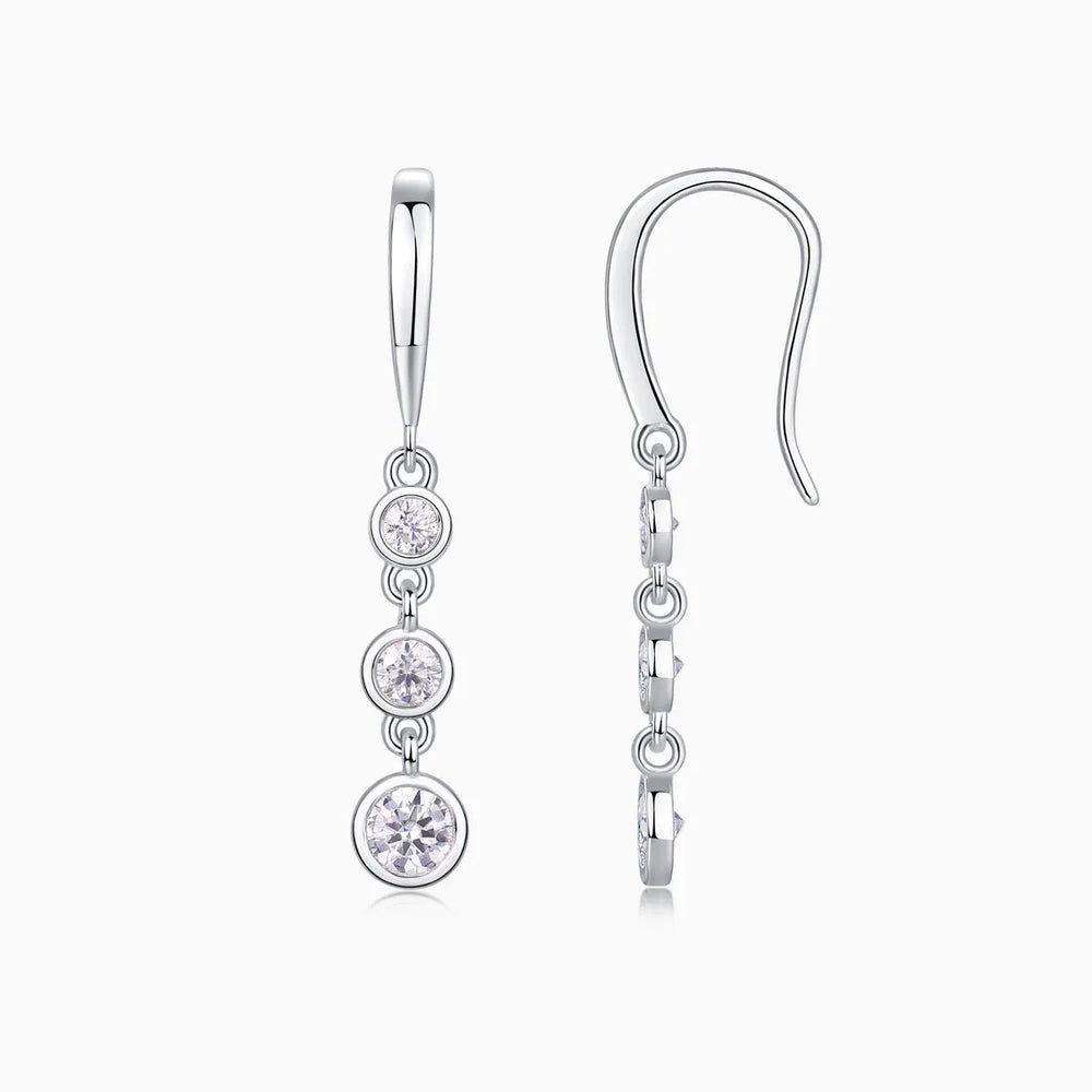 3-stone graduated drop earrings with bezel-set round moissanite, white gold vermeil