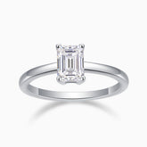 Solitaire emerald-cut moissanite ring with four-prong setting, white gold vermeil