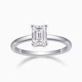 Solitaire emerald-cut moissanite ring with four-prong setting, white gold vermeil