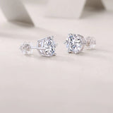 Moissanite solitaire stud earrings side view, round stone in 6-prong setting