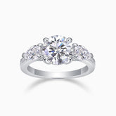 Three-stone moissanite engagement ring, white gold-plated band with round center and side stones