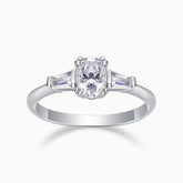 Three-stone oval moissanite ring in white gold, central oval with side baguettes