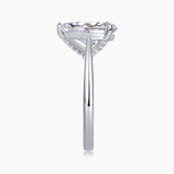 White gold vermeil pear-cut solitaire moissanite ring with side prongs and cathedral setting