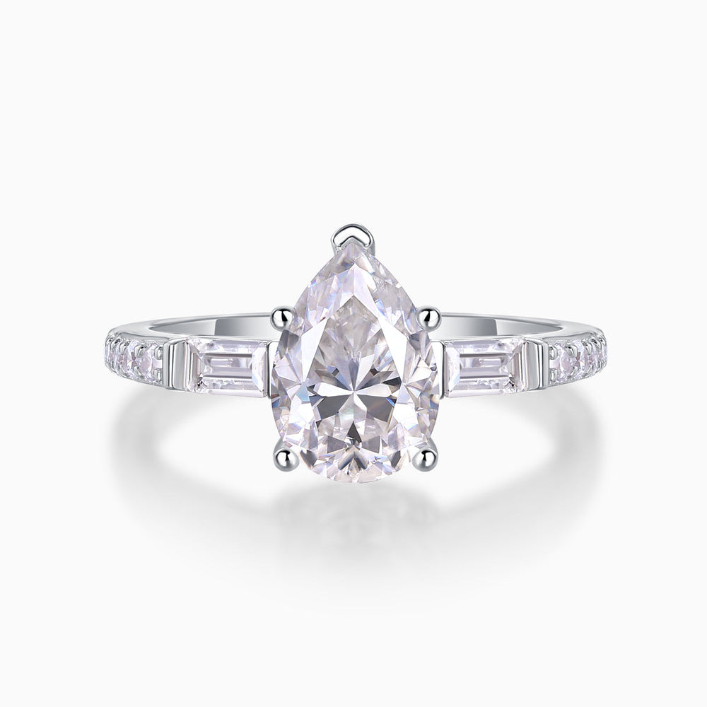 Pear-cut pavé moissanite engagement ring with baguette side stones, white gold vermeil