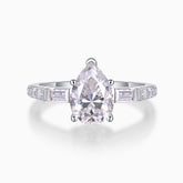 Pear-cut pavé moissanite engagement ring with baguette side stones, white gold vermeil