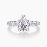 Pear-cut pavé moissanite engagement ring with baguette side stones, white gold vermeil
