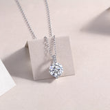 Round moissanite solitaire pendant with pavé bail, white gold vermeil chain