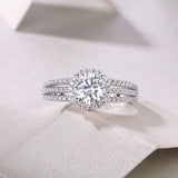 Round halo moissanite ring with pavé bands and split shank, white gold vermeil