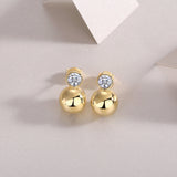 Gold vermeil bezel moissanite ball stud earrings with round stone and polished sphere