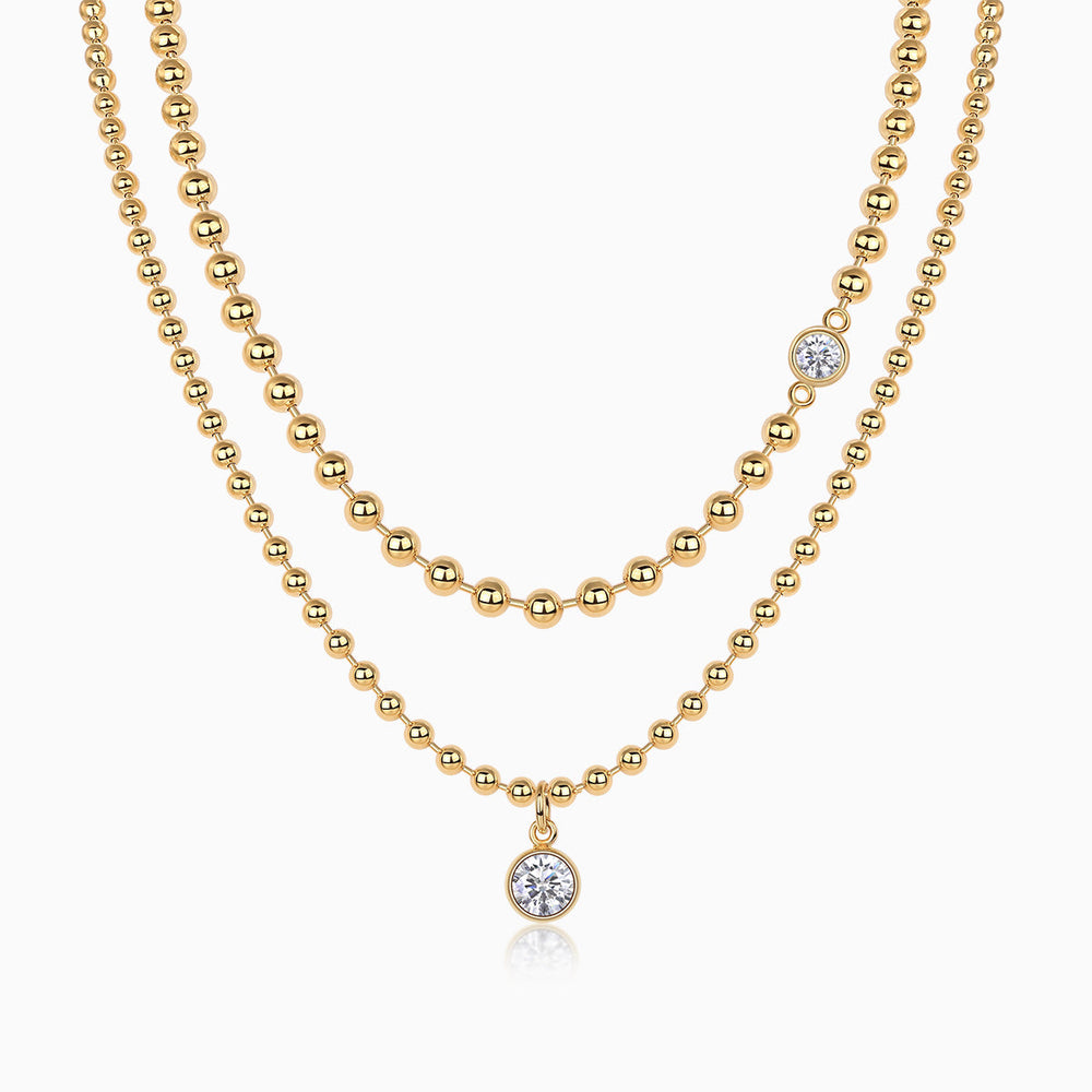 Double-layer beaded necklace set with round blue gem pendant, yellow gold vermeil