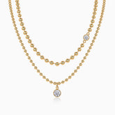 Double-layer beaded necklace set with round blue gem pendant, yellow gold vermeil