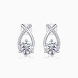 Moissanite stud earrings in white gold vermeil, pear teardrop with ribbon pavé detailing