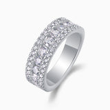 Triple row half eternity moissanite ring with rounded settings and bright round stones