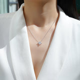 Floral cluster moissanite pendant necklace on neckline, white gold vermeil