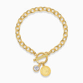Moissanite toggle chain bracelet in yellow gold vermeil with coin charm and round stone