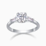 Three-stone round moissanite engagement ring, white metal band with center round stone
