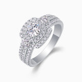 Square center moissanite with double halo and pavé rows, side view of ring