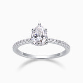 Pear cut pavé moissanite engagement ring, prong-set pear center, white metal band