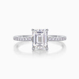Emerald-cut center moissanite with pavé band, white gold vermeil, front view