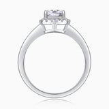 Top view: cushion cut moissanite center stone with halo prongs, white gold vermeil ring