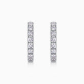 White gold vermeil huggie hoop earrings, single row moissanite in shared prong settings