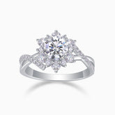 Round halo twist engagement ring with large center moissanite and split pavé band