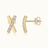 X-shaped cross moissanite pave stud earrings in yellow gold vermeil