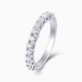 Half pavé eternity band, white gold vermeil, side view of round moissanite stones