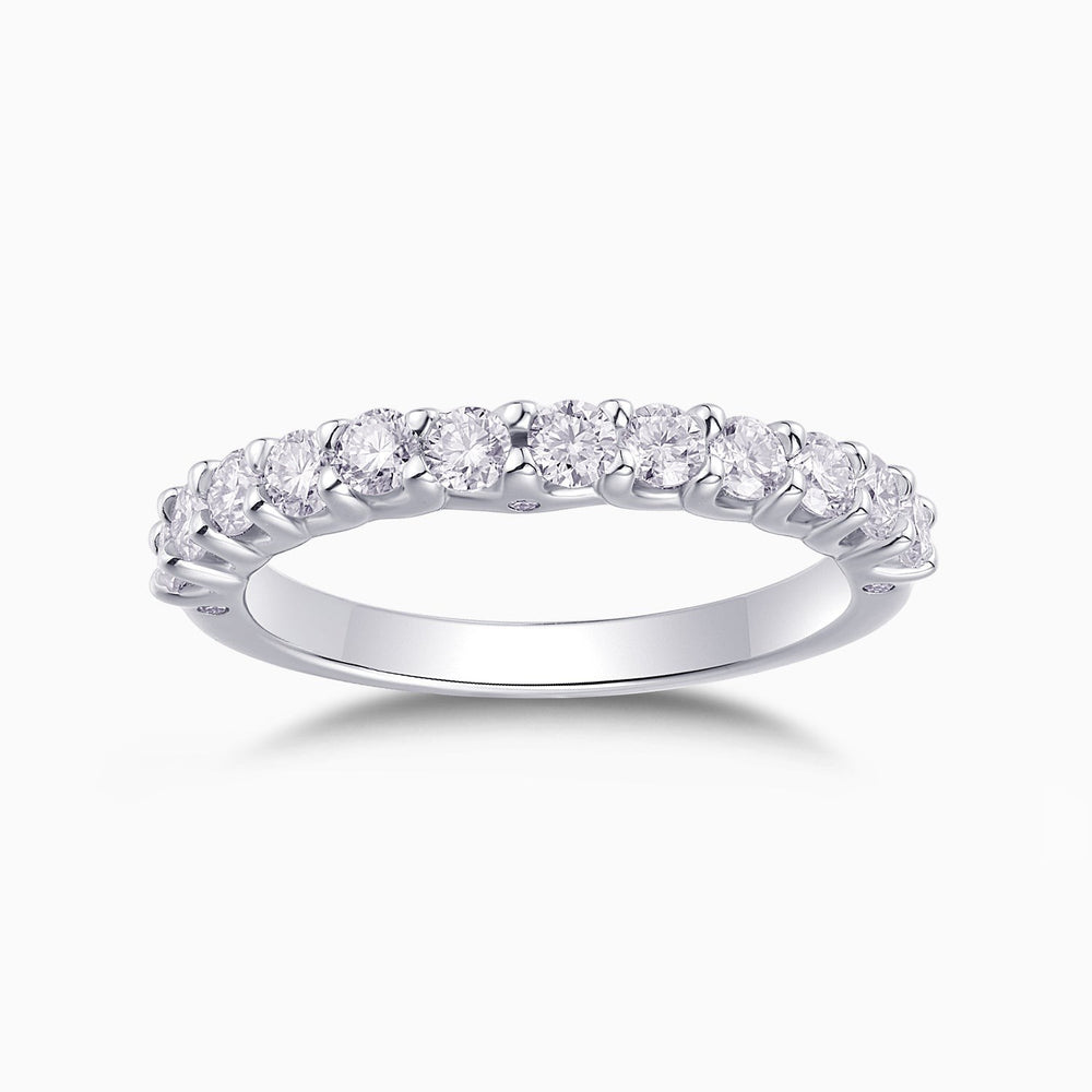 Half pavé eternity band in white gold vermeil with round moissanite stones