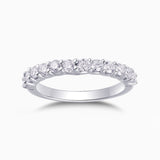 Half pavé eternity band in white gold vermeil with round moissanite stones