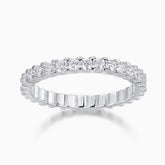White gold vermeil moissanite pavé eternity band with a continuous row of round stones