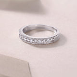 Moissanite half pavé eternity ring in white gold vermeil with round stones