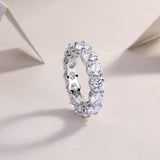 Round Moissanite Pavé wedding band, white-gold vermeil side view with set stones