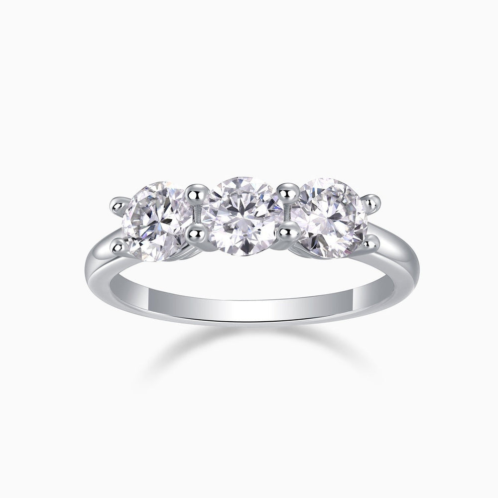 Three-stone moissanite wedding band in white gold vermeil with three round stones