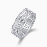 Triple row moissanite wide band ring in white metal, angled side view