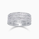 Triple row moissanite wide band ring with white stones on a white metal band