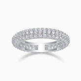 Triple-row pavé moissanite band ring, white gold vermeil, prong-set sparkle profile.