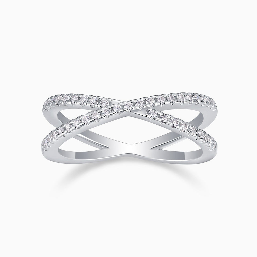 X-Cross Moissanite pavé band ring with X-shaped crossover and clear stones on white metal