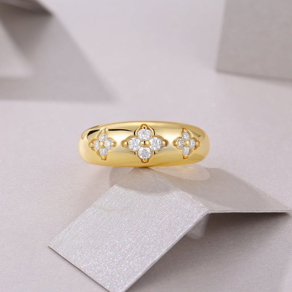 Moissanite eternity band ring in yellow gold vermeil with round stones, on box