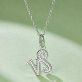 Capricorn pendant necklace with white gold vermeil bail and round pavé moissanite