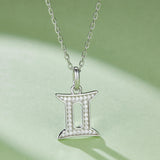 Gemini zodiac pendant in white gold vermeil, pavé stones framing the double-bars