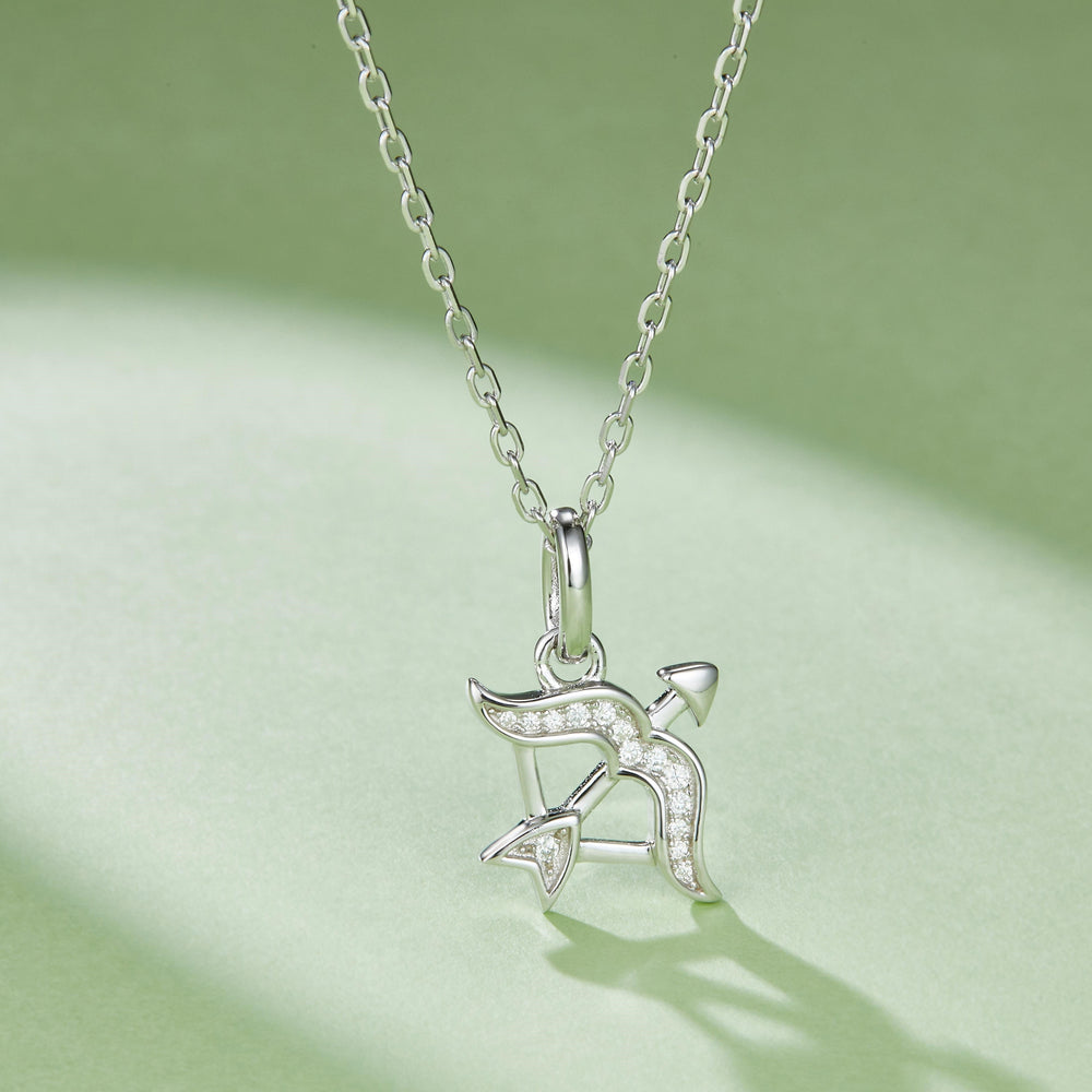 Sagittarius charm pendant on white gold vermeil chain with pavé star detail