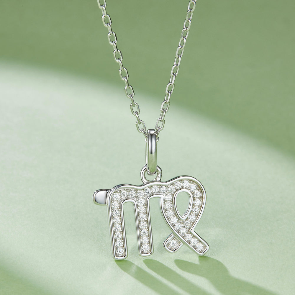 Virgo pendant necklace with pavé crystals and green enamel, detailed clasp and bail