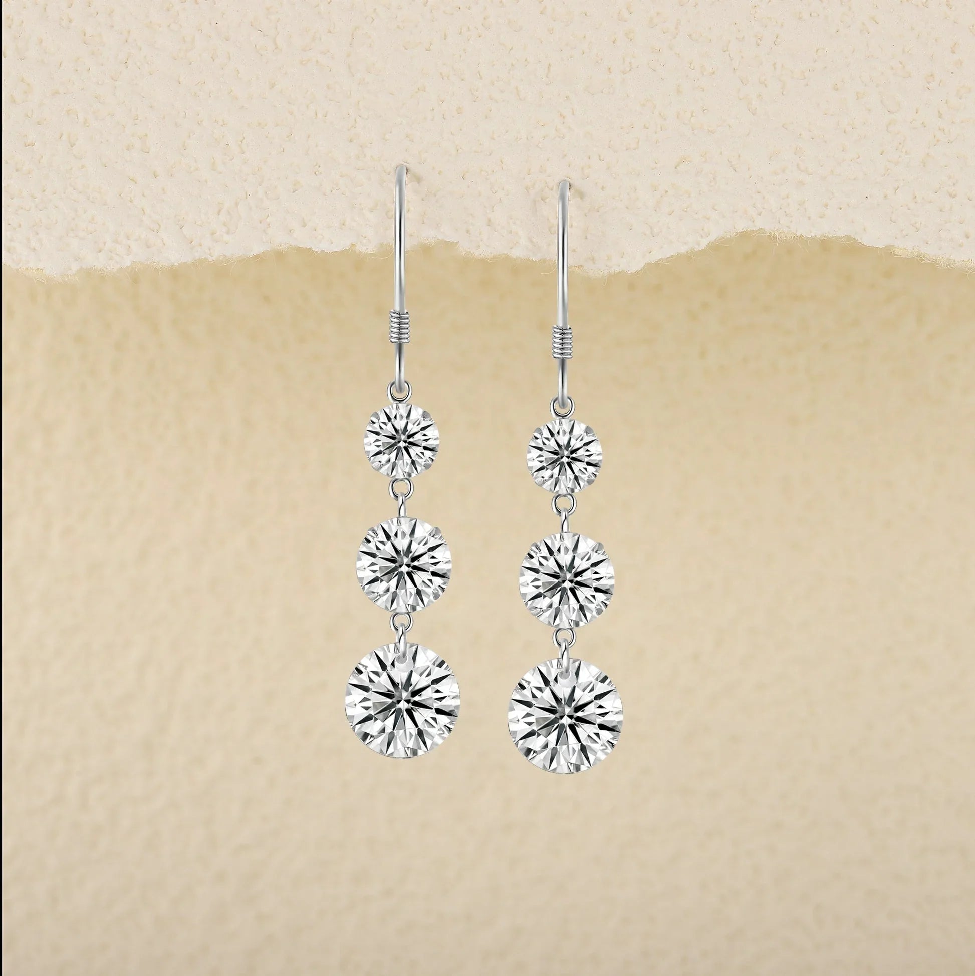 3-stone graduated cascade drop earrings, three round moissanite stones in white gold vermeil