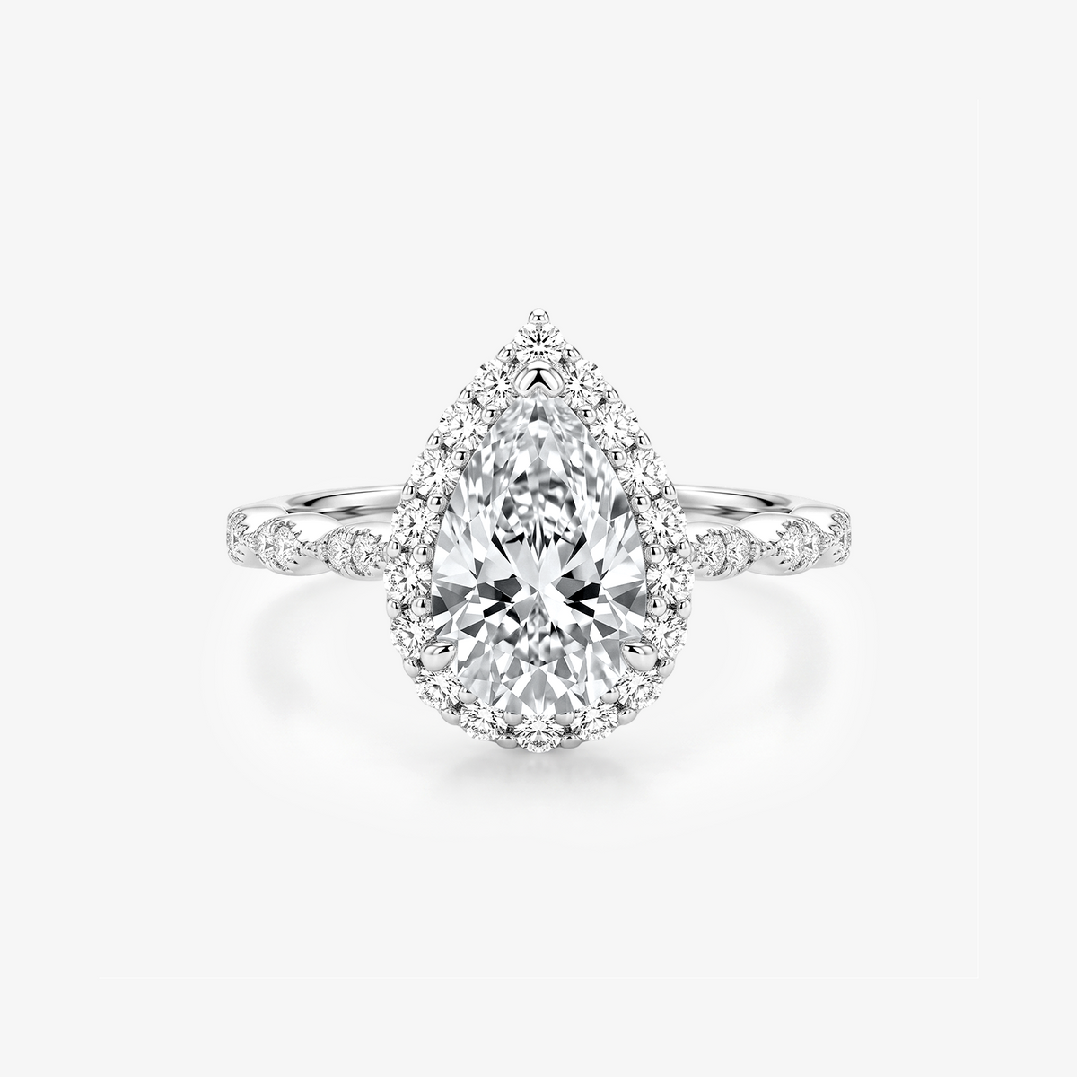 Pear Moissanite Halo Twist Pavé Ring