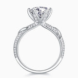 Round center moissanite with pavé split shank and double-set prongs, white gold vermeil