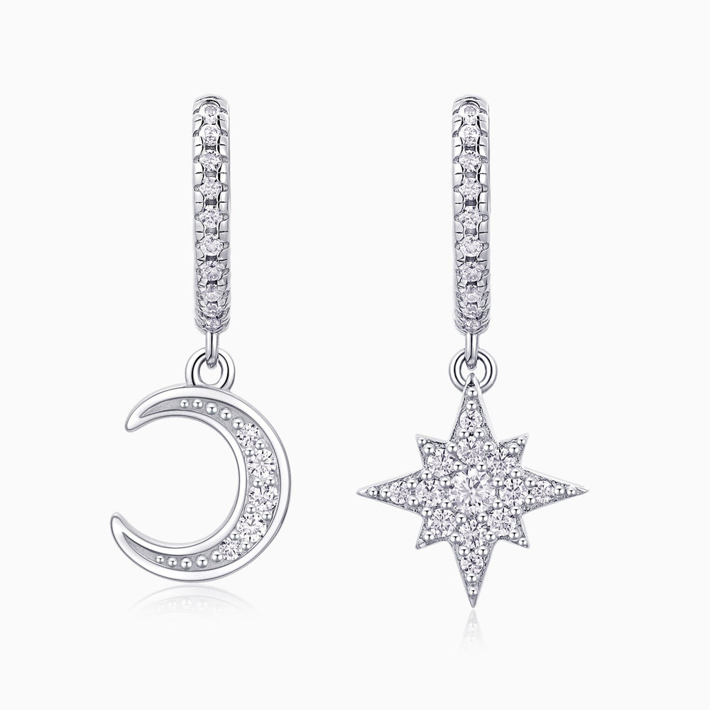Asymmetric moon and star drop earrings in white gold vermeil with pavé detailing